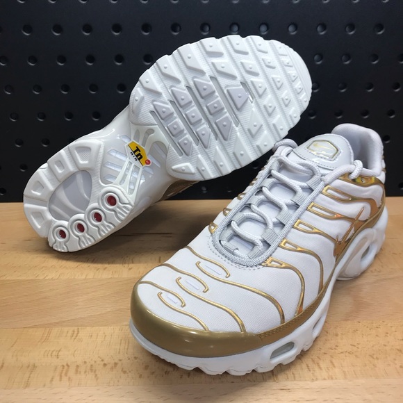 gold and white nike air max plus